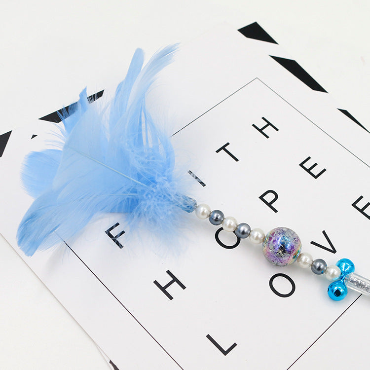 Colored feather bells, funny cats, fairy sticks