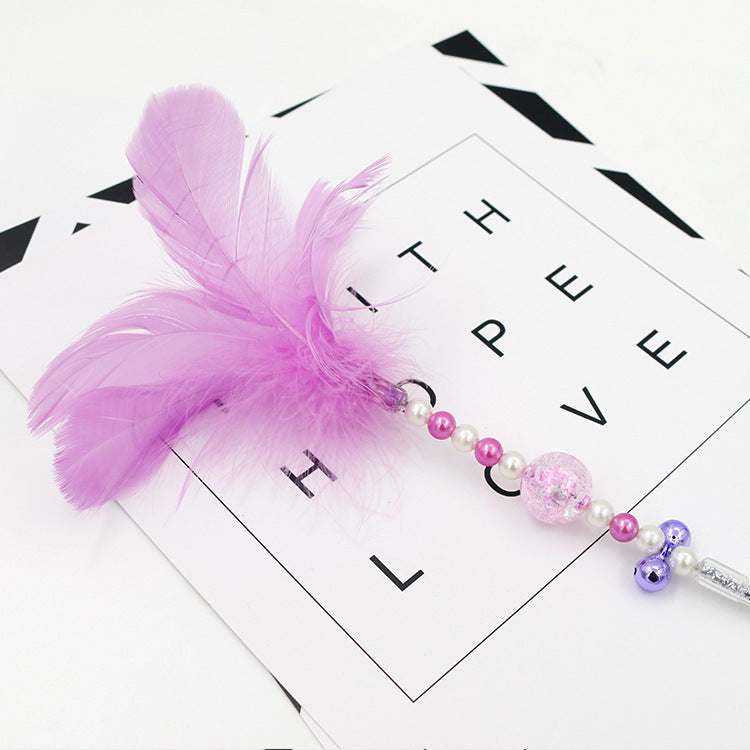 Colored feather bells, funny cats, fairy sticks