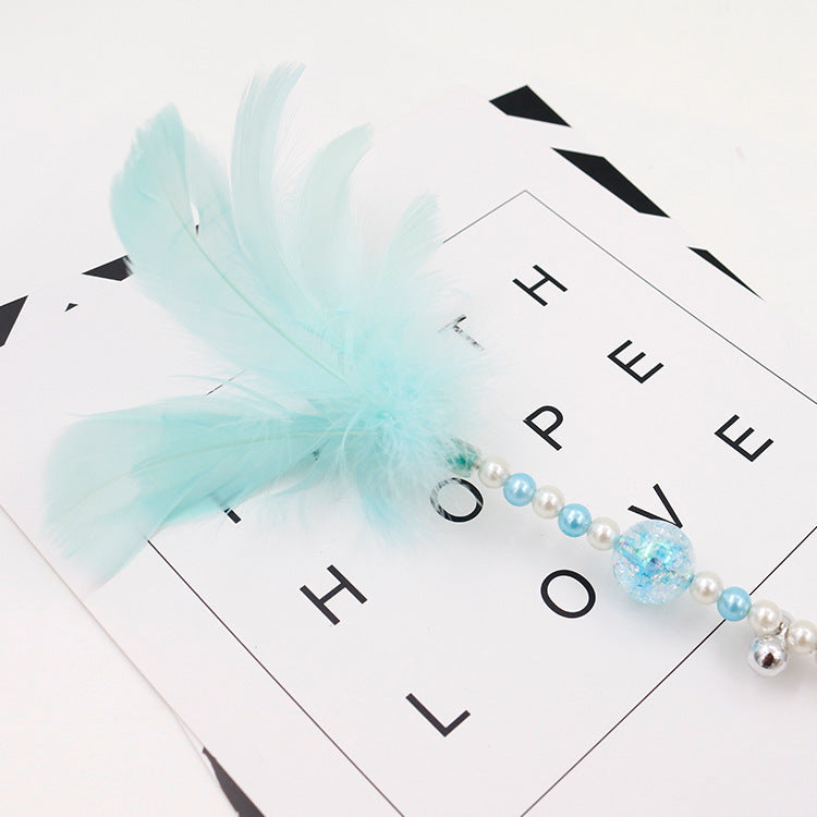 Colored feather bells, funny cats, fairy sticks