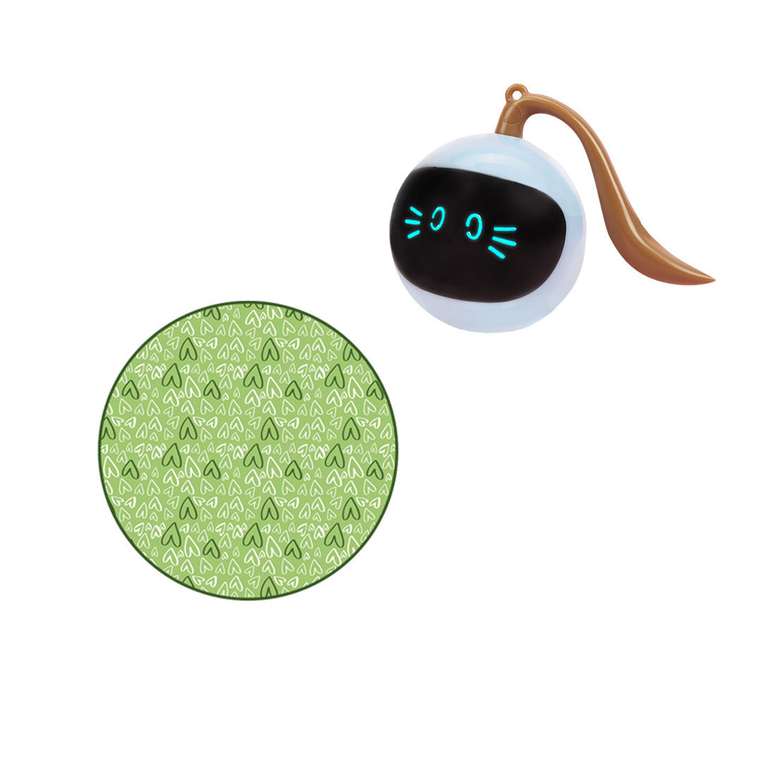 The image shows a cat interacting with a pink hunting cover and a green hunting cover, along with a USB-powered electric toy ball.