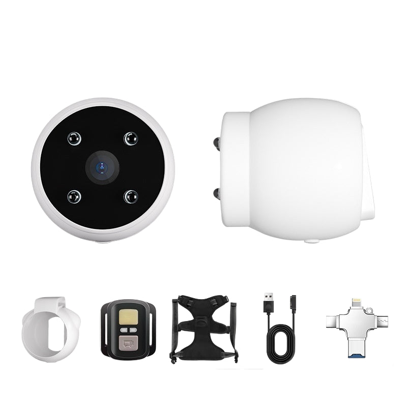 A white fluffy dog wearing a blue harness equipped with a pet recorder camera.