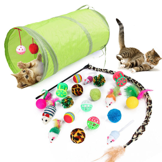 A set of cat toys including a plush tube tunnel and various plush balls with catnip, feathers, and bell attachments.