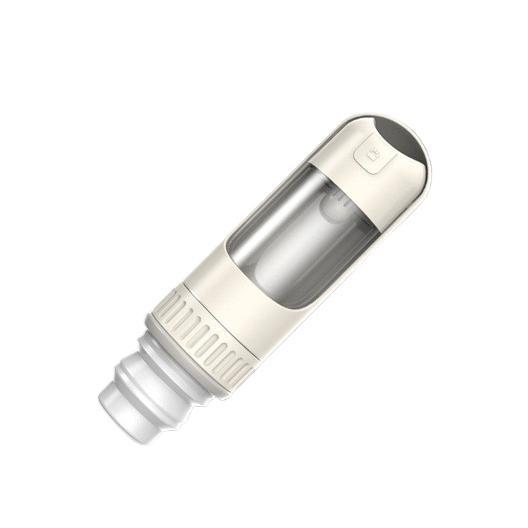 A portable dog water cup attached to a leash, with a corgi dog looking at the camera in the foreground.