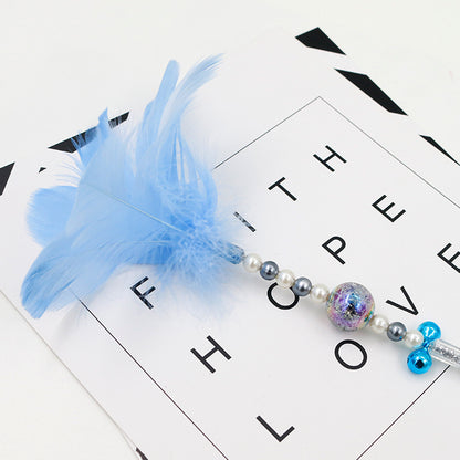 Colored feather bells, funny cats, fairy sticks