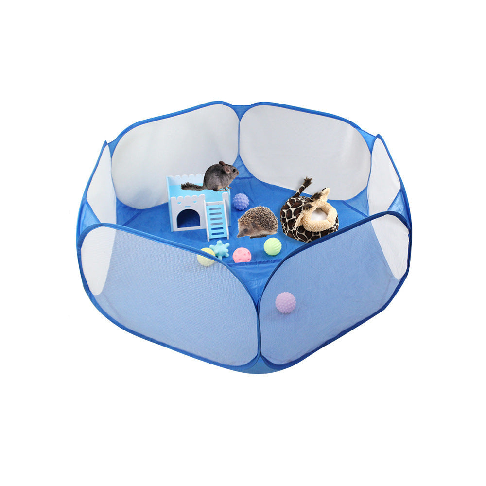 Pet playpen with small animals and toys on a white background