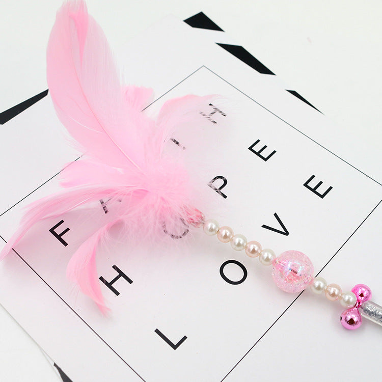 Colored feather bells, funny cats, fairy sticks