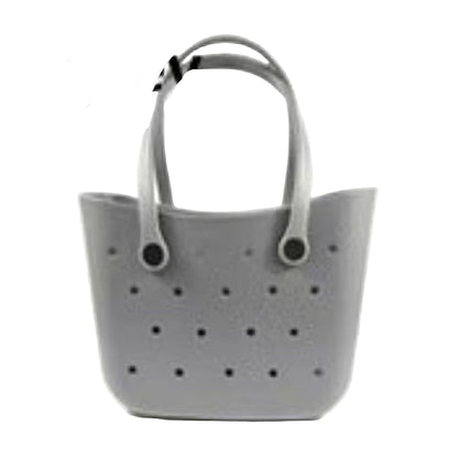 Gray handbag with perforated design on a white background
