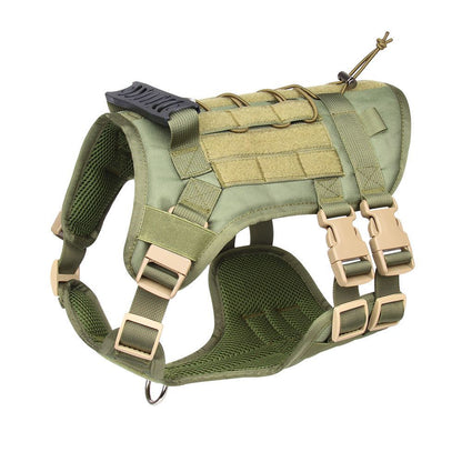 A dog harness designed for tactical use, displayed on a mannequin. The harness is green with black accents, featuring multiple straps and attachment points.