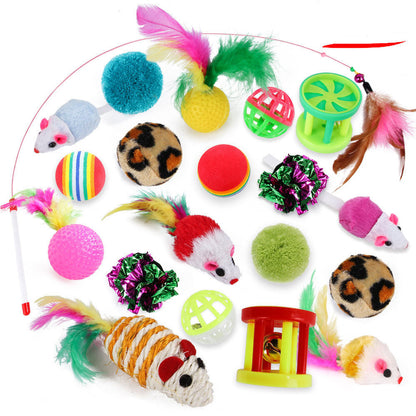 Assorted colorful cat toys on a white background
