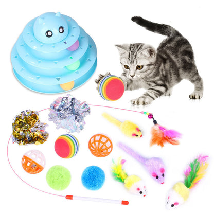 A set of cat toys including a plush tube tunnel and various plush balls with catnip, feathers, and bell attachments.