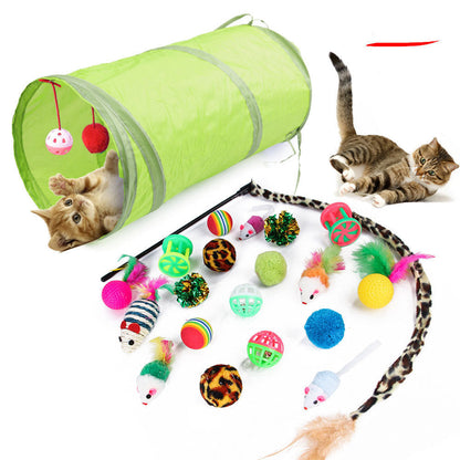 A set of cat toys including a plush tube tunnel and various plush balls with catnip, feathers, and bell attachments.